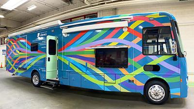 New multi-colored mobile library as big as an RV