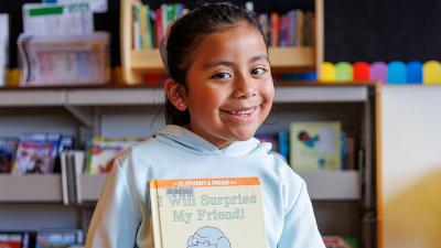 Child holding a book