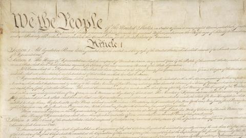 Photo of the constitution, centering on the words 