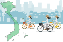 Three women on bicycles wearing traditional Vietnamese straw hats in front of a cityscape, next to a superimposed image of the country of Vietnam