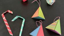 origami ornaments including candy canes and pyramid shapes