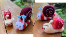 Image of two snails made from felt with peppermint stripes