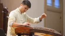 Photo of Mr. Hai Bi playing the guzheng