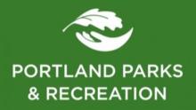 Logo of a leaf over a hand with text Portland Parks & Recreation
