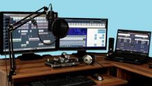 Photo of an audio visual mixing studio setup on a blue background
