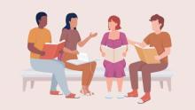 Group of people talking and holding books