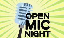 Graphic for open mic night with a silver microphone surrounded by a green aura and the words Open Mic Night in black.