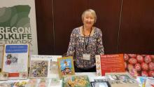 Photograph Daniela Sipkova-Mahoney with several books