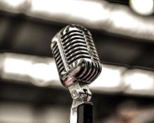 Graphic of a microphone with the words 