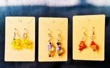 photo of three pairs of Deyadira's handmade earrings in different colors