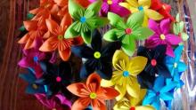 Brightly colored arrangement of origami flowers