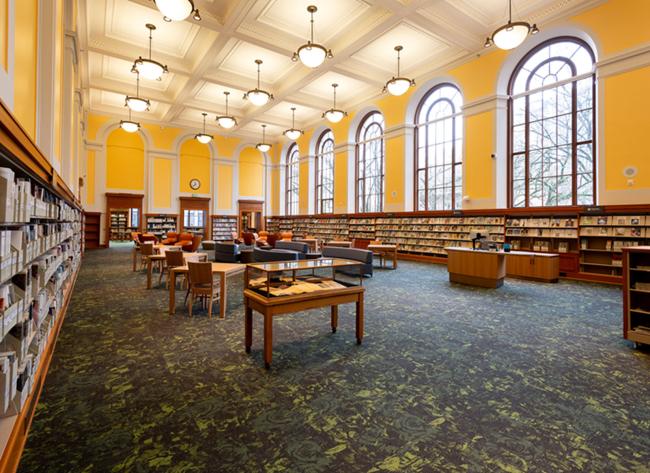 Inside Central Library in a large room with tall ceilings and windows