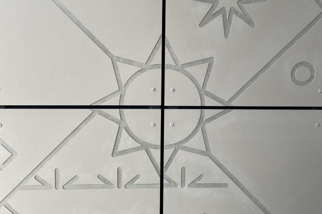 Close up image of the pattern designs carved into the exterior walls of Midland Library